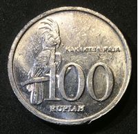 Изображение Индонезия 1999 г. • 100 рупий • регулярный выпуск • герб Индонезии • попугай • BU